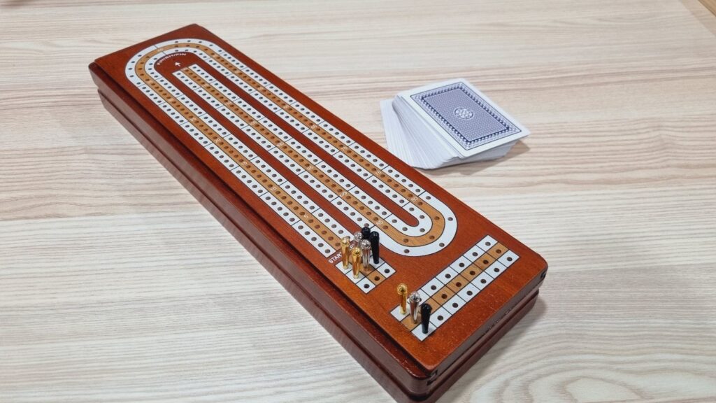 holes cribbage board deck of cards